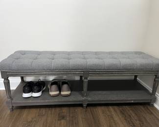 Beautiful 2 level gray cushioned bench. A little wear. Dimensions: Height= 7'', Depth= 16'', Length= 55''