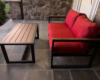 Outdoor seating and matching table. Washable cushion covers. Matching table and loveseat chair. Hampton Bay West Park Black Aluminum Outdoor Patio Loveseat with CushionGuard Chili Red Cushions and Hampton Bay Outdoor Coffee Table.
