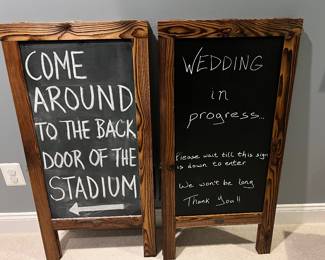 2 Wood chalk Easels. Perfect condition. Both sides of both Easels have been written on before but only once on each side. Dimensions: Height= 40'', Width=20 '', Depth of base opened= 28'', Depth closed = 1.5''