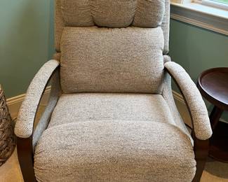 The most comfortable Rocking Chair / Reclining Chair you will ever sit on. Perfect Condition. Can be used in the nursery room as well. Dimensions: Height: 40'', Width: 31'', Depth: 35''