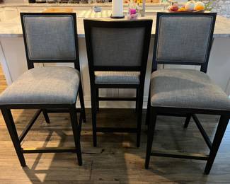 3 Barstools from Restoration Hardware. Perfect Condition Purchasesd for $3,200 at Restoration Hardware Gray Cushions. Black Wood Very comfortable