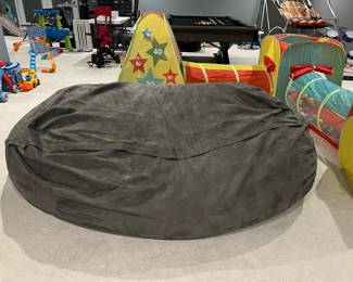 Large bean bag chair. Very comfortable Pet and smoke free house. Perfect condition. Barely used it. Gray. 7ft