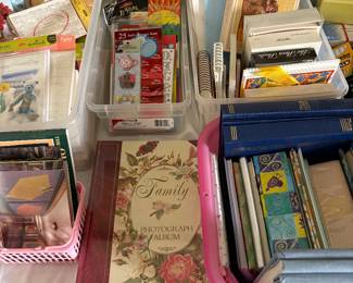 many cards, notebooks, photo albums, picture frames