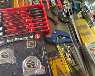 Assorted Hand Tool Collection with Snap-on Screwdriver Set and Toolrich Tape Measures
