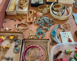 Discover a treasure trove of vintage accessories and nostalgic collectibles in this unique estate find. This collection features a wonderful mix of classic jewelry styles, wearable watches, and small trinkets perfect for collectors, resellers, or vintage enthusiasts.