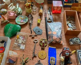 Discover a treasure trove of nostalgia with this eclectic assortment of mid-century collectibles, political memorabilia, and vintage novelty trinkets. Perfect for resellers, button collectors, and history enthusiasts alike.