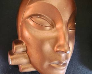 This piece is a prominent example of mid-1930s European home decor trends, designed by French artist Marcel Avond (1900-1956).