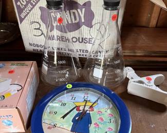 Some estate sale finds just make you stop and laugh… because where else would you find laboratory glassware and Madeline hanging out together?