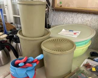 Add a touch of retro charm to your kitchen with this collection of classic kitchen essentials and vintage finds! This lot features highly collectible, authentic vintage Tupperware in popular mid-century colors.