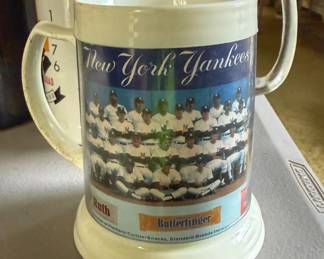 Add a piece of baseball history to your collection! This rare, vintage New York Yankees insulated plastic team tankard mug is up for grabs. Manufactured in the late 1970s by Dawn, this fantastic promotional item features the iconic Yankees team photo wrapped around the center.