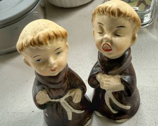 This is a pair of vintage Sanmyro Japan ceramic singing Franciscan friar monk salt and pepper shakers.