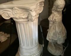 Pedestal and statue