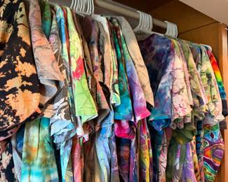 Tie-dye shirts, some signed