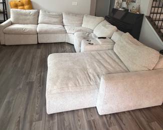 Ashley Sectional with 2 power recliners, 1 chase, and one charging station armrest with 2 cup holders