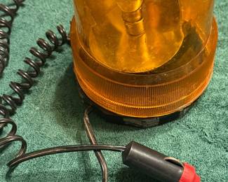 Vintage 12-volt amber rotating beacon warning light