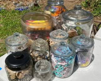 Buckles Beads Buttons and Assorted Craft Supplies in Glass Jars