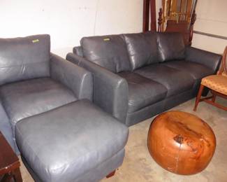 Leather Couch, Chair and Ottoman and Table made from a solid piece of wood.