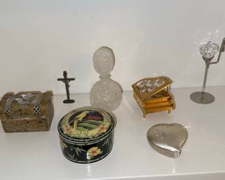 Assorted Decorative Trinkets including Carved Stone Box, Porcelain Trinket Box, Miniature Piano, Perfume Bottle, Heart Box and Crucifix