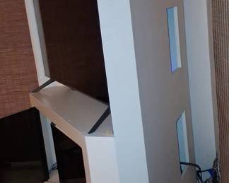 Custom Corner Media Console with Integrated TV Mount