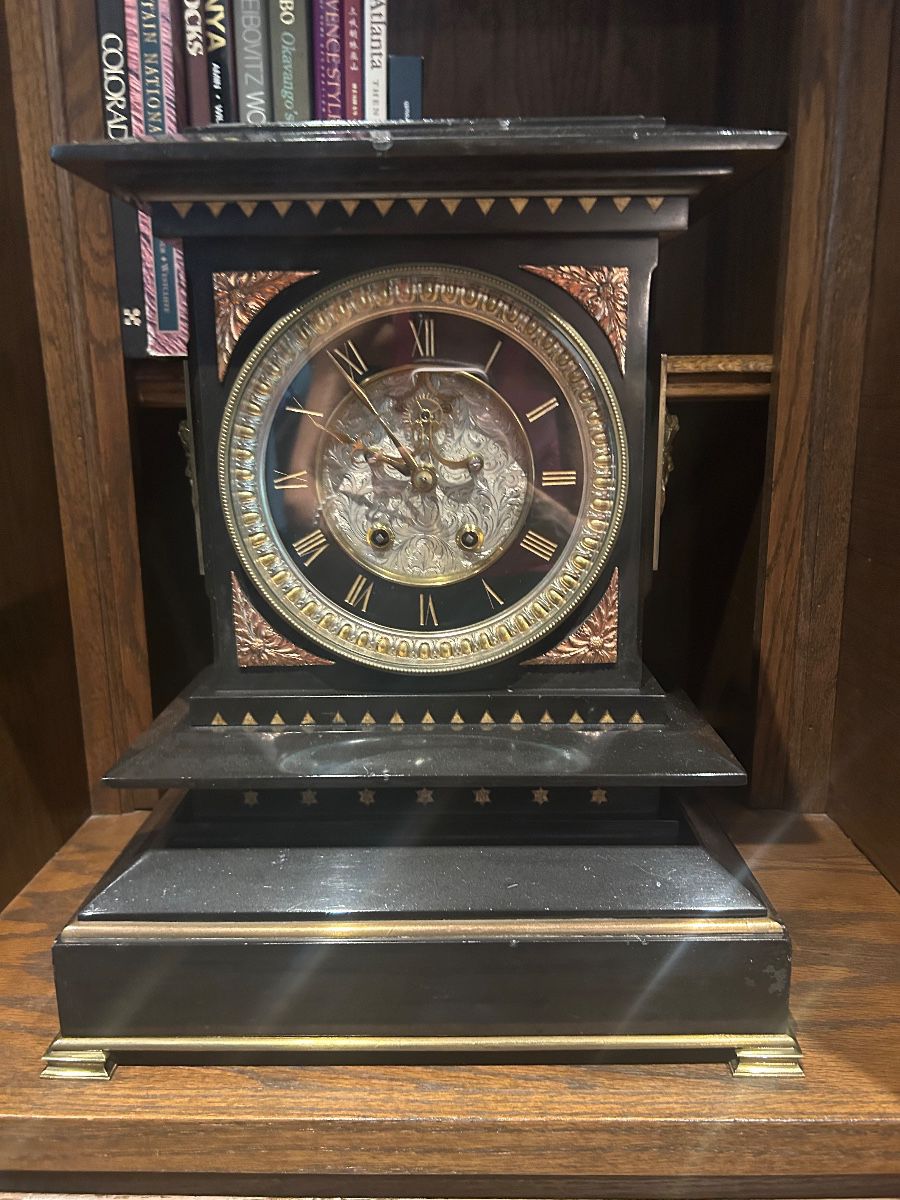 circa 1848 Black marble clock adorned with bronze, copper and silver