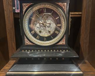 circa 1848 Black marble clock adorned with bronze, copper and silver