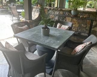 Stone table with four chairs- this needs to stay for staging until September