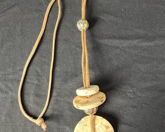 Hand Carved Stone Disc Pendant Necklace with Geometric Incising