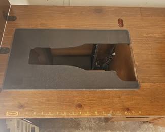 Vintage Sewing Machine Cabinet with Fold-Out Design