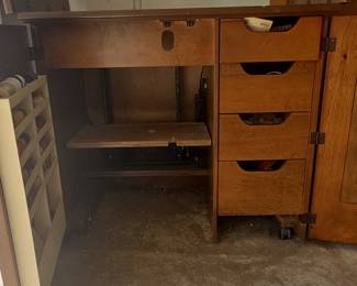 Vintage Sewing Machine Cabinet with Fold-Out Design