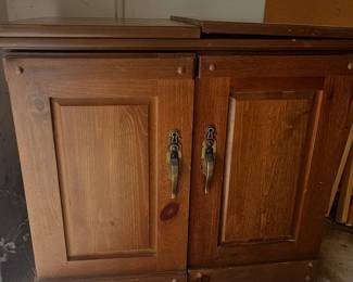 Vintage Sewing Machine Cabinet with Fold-Out Design