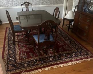 Dining table and 6 chairs 100% hand woven wool rug made in India 7.6x9.6