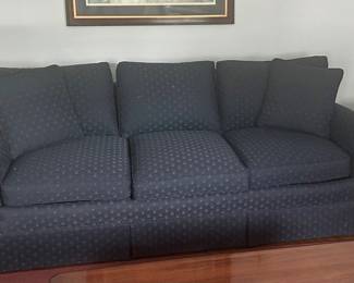 Blue upholstered couch