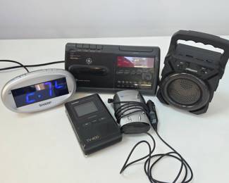 Lot #B40 - Vintage Sharp Digital Alarm Clock, GE Cassette Radio, Casio TV-400 LCD Pocket TV, Cobra 10 Band Laser Scanner, and 2Boom Portable Speaker
