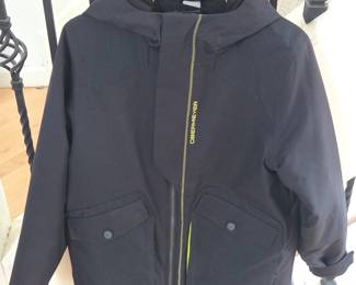 Lot #B191 - Obermeyer Teen Large Black Ski Jacket with Yellow Lining and Multiple Pockets