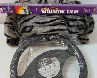Lot #B112 - BDK Steering Wheel Cover, Static-Cling Window Film, & Animal Print Car Seat Covers!