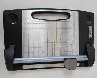 Lot #B156 - Fiskars Rotary Paper Trimmer with Safety Guard and Measurement Grid