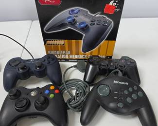 Lot #B139 - Lot of Gaming Controllers: Microsoft SideWinder, Sony Wireless, Xbox360, Logitech Dual Action, Logitech PC Rumblepad