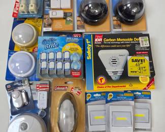 Lot #B160 - Safety 1st Carbon Monoxide Detector & Security Decoy Cameras with LED Wall Tap Lights, Nightlights + More!