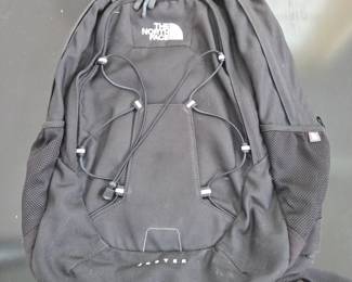 Lot #B173 - The North Face Jester Black Backpack Durable Outdoor Daypack with Multiple Compartments