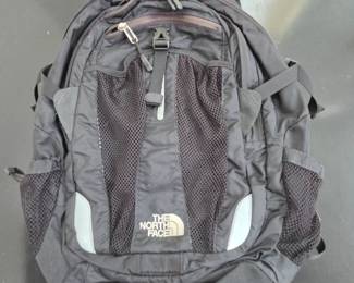 Lot #B175 - The North Face Black Durable Backpack with Multiple Mesh Pockets and Adjustable Straps