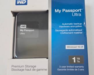 Lot #B63 - WD My Passport Ultra 1TB Portable External Hard Drive with Hardware Encryption