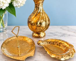This beautiful Holley Ross distinguished China is 22 karat weeping gold