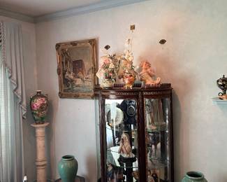 Antique Bow  front display cabinet with ormolu