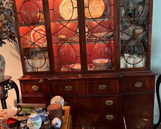 A Pair of Mahogany Chinese Chippendale Breakfronts with butlers desk. Circa 1930