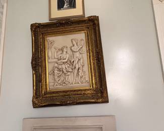 From top to bottom: Framed Photo by Craig Deitz $125; Marble Raised Relief Framed- $195; Plaster Plaque on Wood $150