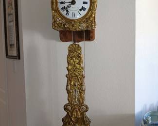 Comtoise clock featuring repoussé