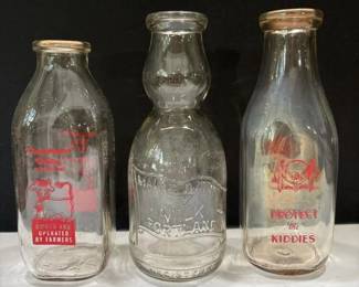 261 trioofvintagemilkbottles