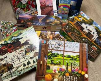 160 assortedjigsawpuzzlelotfeaturingfol