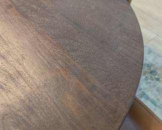 Solid mango wood in brown finish.
