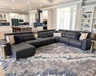 STRESSLESS sectional overall dimensions as shown 163" x 115.5". Chaise length is 70.5". Arm length is 43.5". ALL HEAD RESTS ARE DOWN.